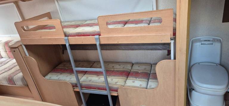 Bunk bed frame and two sets of cushions for camper caravan motorhome boat.