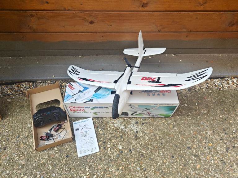 OMP T720 RC trainer aeroplane with original controller and optional S-FHSS receiver fitted. 