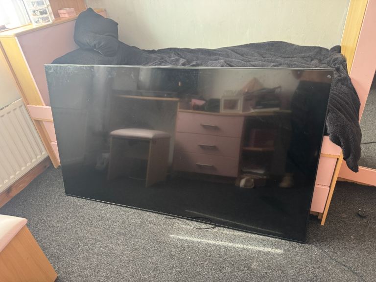 Large Black Flat Screen TV – Good Condition