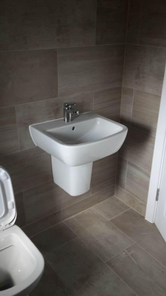 Superbly presented three-bedroom end of terrace house Brighton