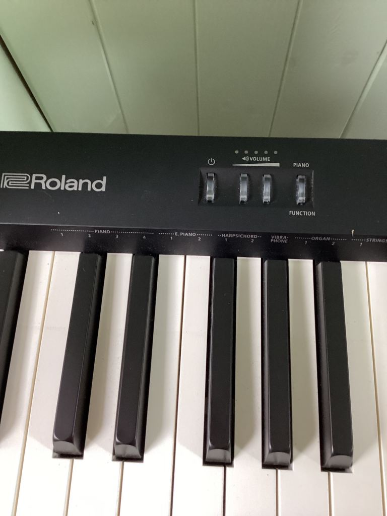Roland FP10 digital piano with stand and stool
