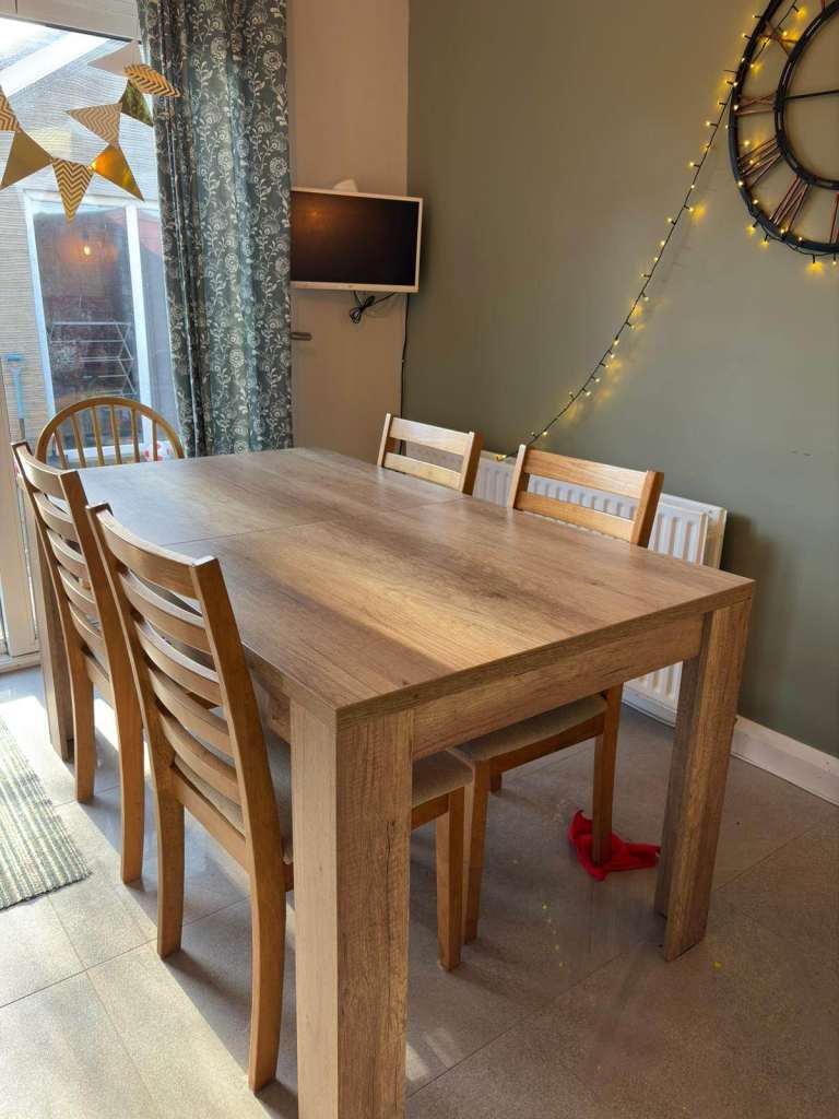 Oak Effect dining table and 6 Sid wood chairs 