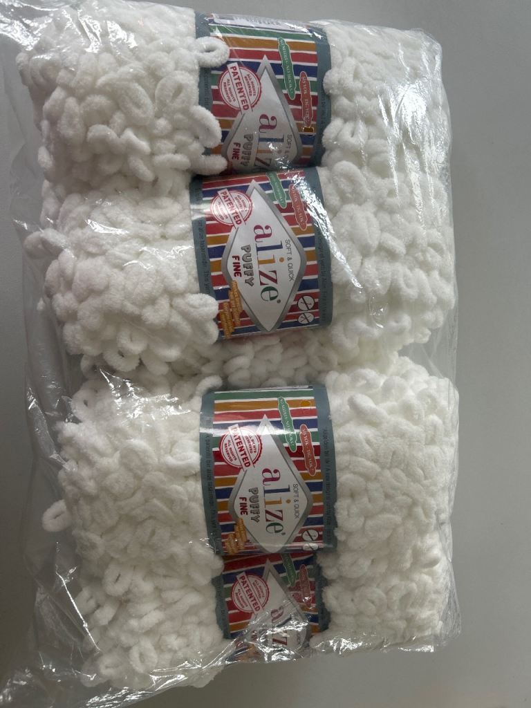 Puffy fine white wool