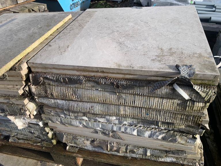 2 pallets of cream and light grey porcelain slabs