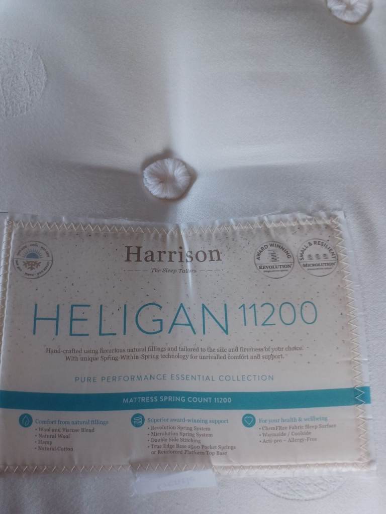 HELIGAN 11200.SINGLE SIZED MATTRESS.   FROM A PET AND SMOKE FREE HOME.  CAN DELIVER 