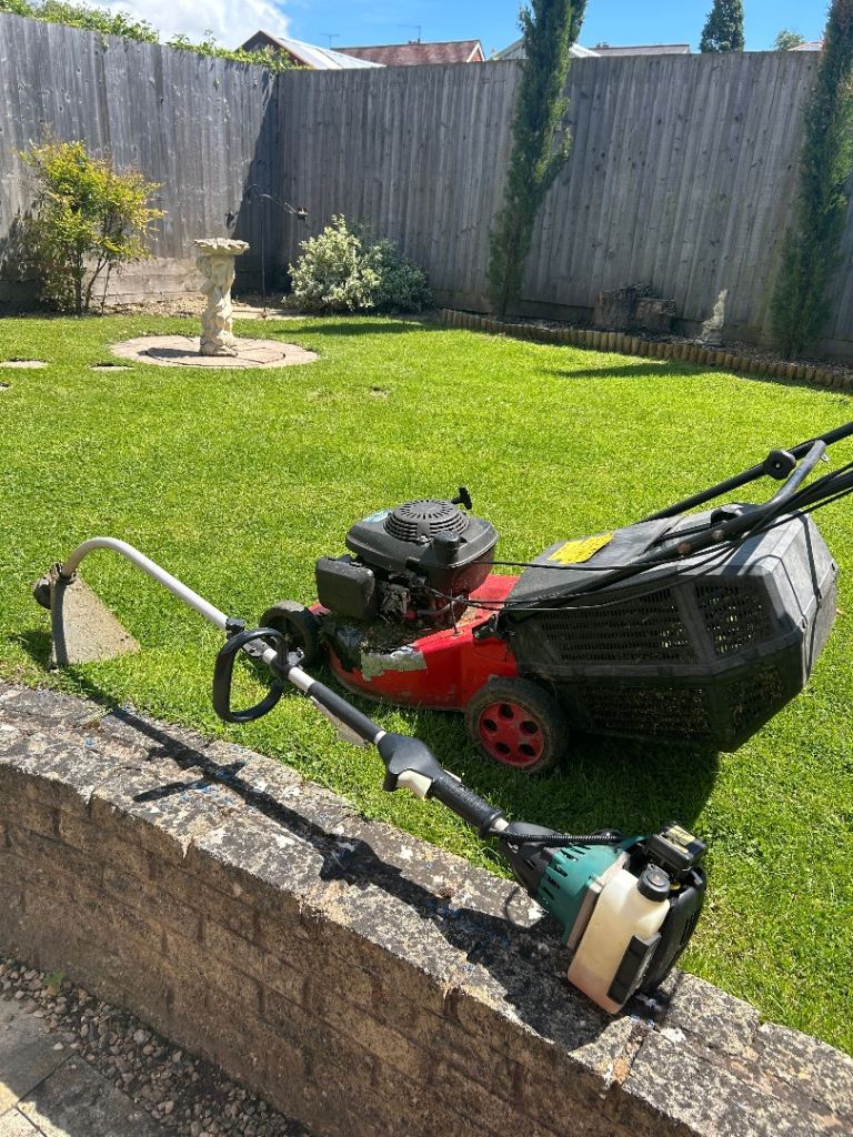 Honda lawn mower and petrol strimmer 