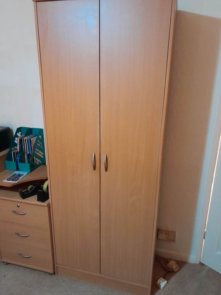 Narrow cupboard or wardrobe