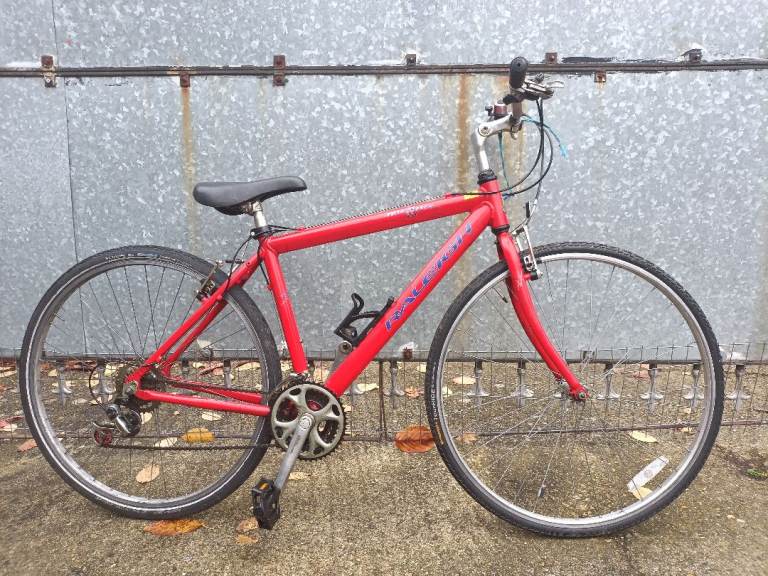 RALEIGH SPORT(RED)700C WHEEL HYBRID ADULTS BIKE,PUNCTURE RESISTANT TYRES,ALLOY BRAKES AND LEVERS