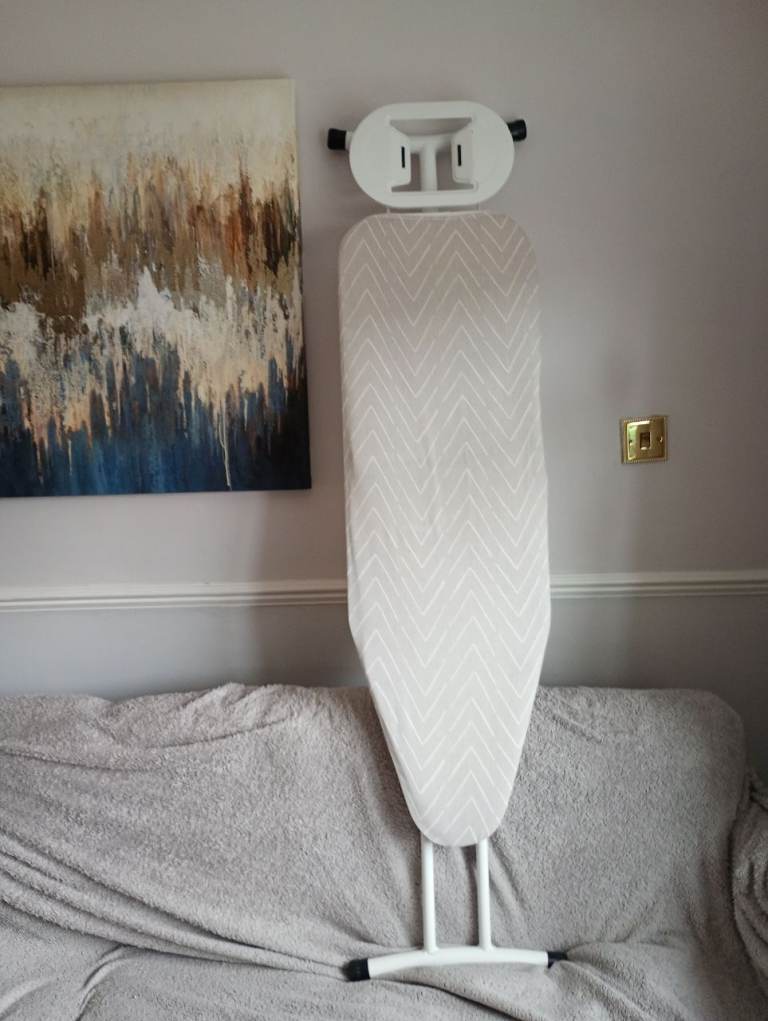 Ironing board with cover, hardly used