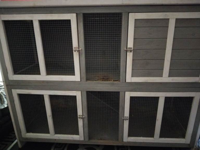 Huge double rabbit hutch with cover.