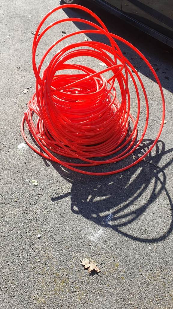 Castellated floor panels and UFH pipe