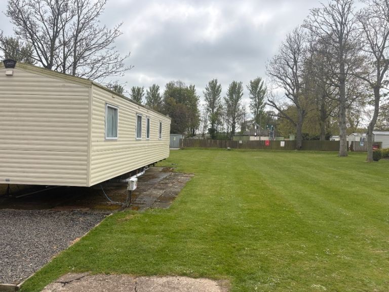 Cheap static caravan sited at Haggerston Castle