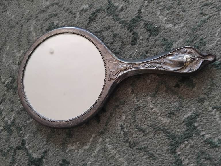 Vintage Silver Hand Mirror with Ornate Design – Good Condition