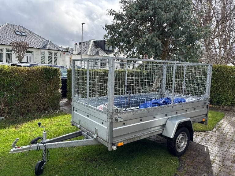 Trailer with cage and cover