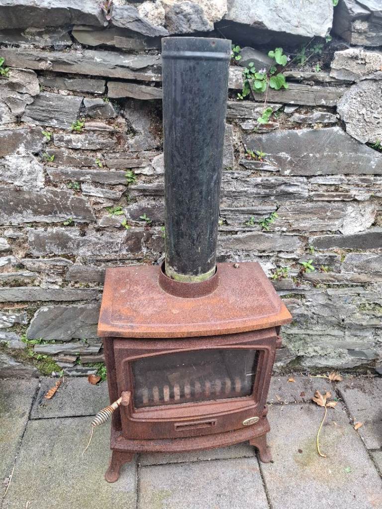 Rustic Wood Burner Fireplace with Flue Pipe