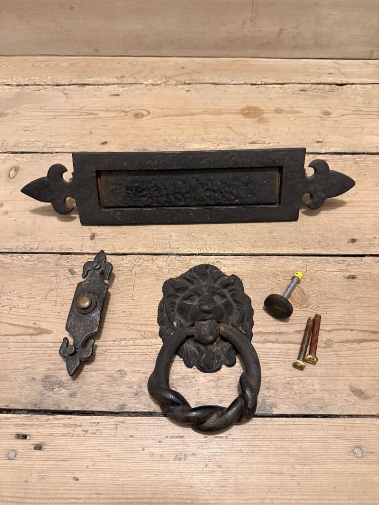 Victorian cast iron lion door knocker and letter flap 