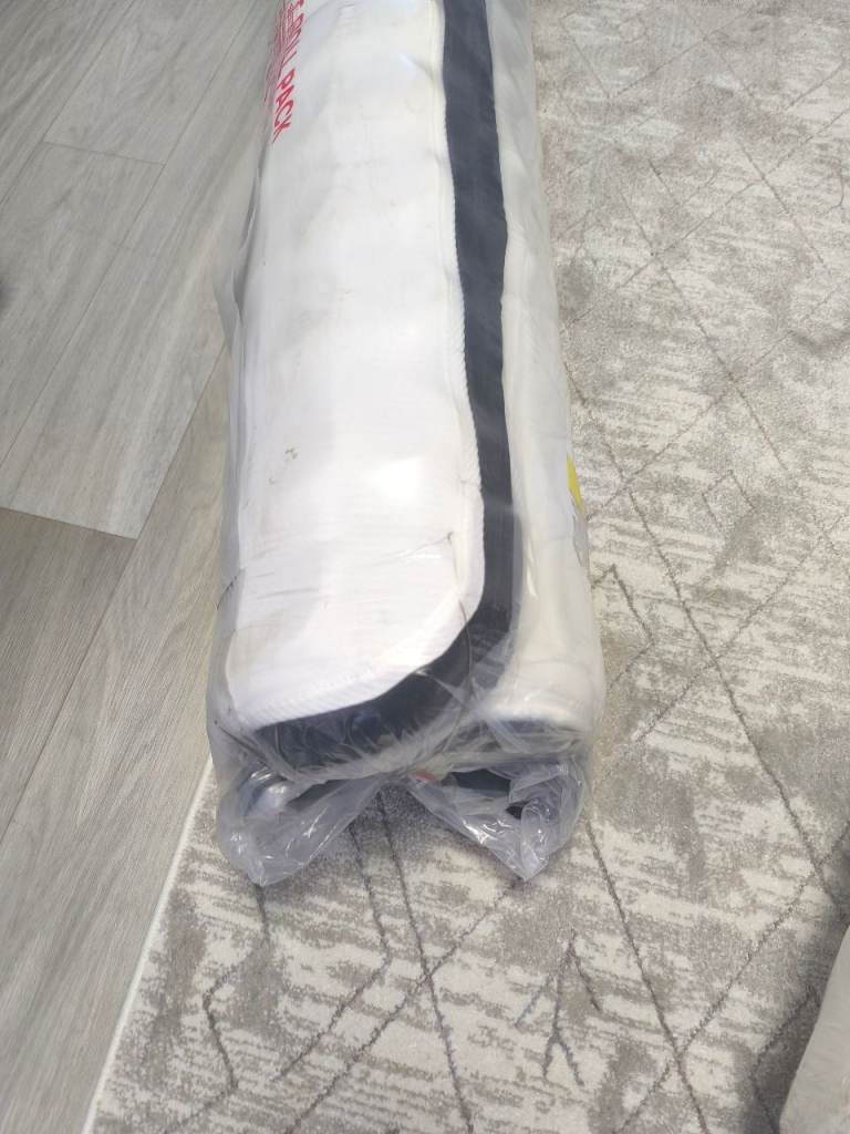 double size mattress, coil spring and top foam layer 