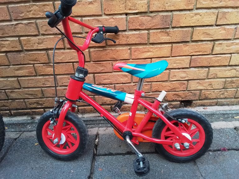 Kids Red Bike – Good Condition, Ready to Ride