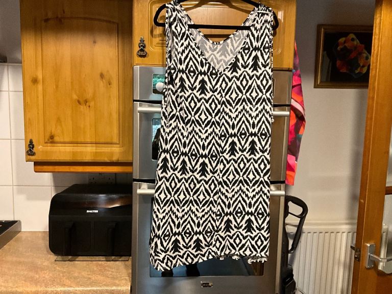 Size 14 top in IMMACULATE CLEAN CONDITION thanks.