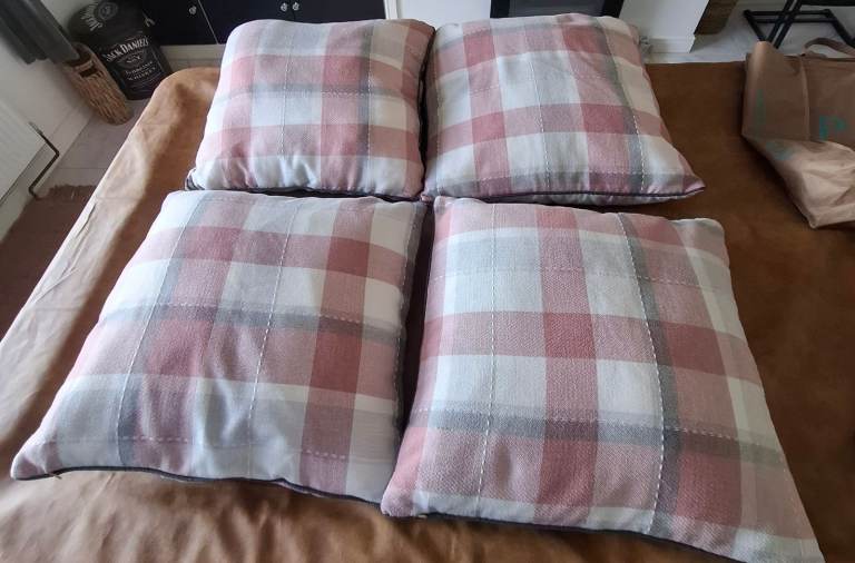 4 x pink and grey check cushions 