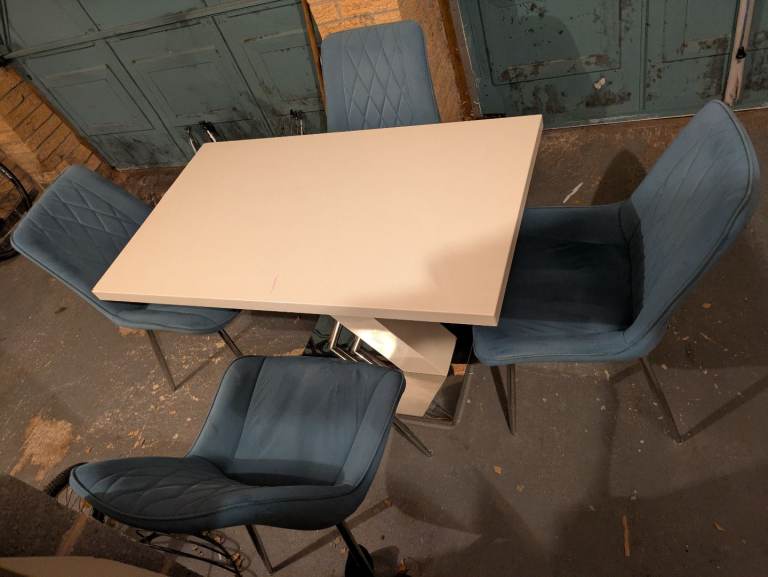 Free dinning table and four chairs 