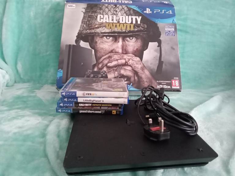 Sony PS4 500GB with Call of Duty WWII and Games – Good Condition