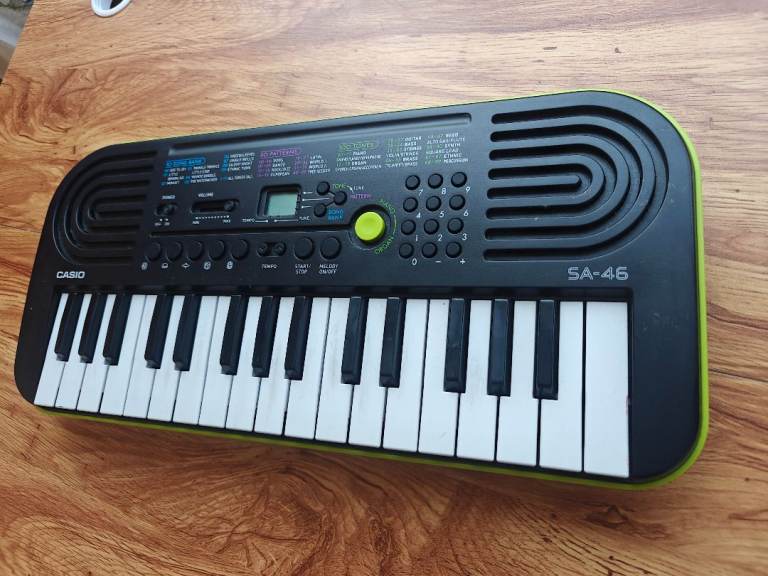 Casio SA-46 Mini Keyboard – Green/Black, Good Condition