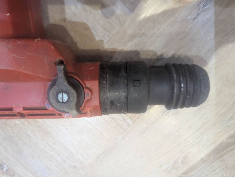 Reliable Hilti TE52 Breaker Drill comes with large drill bits  and case