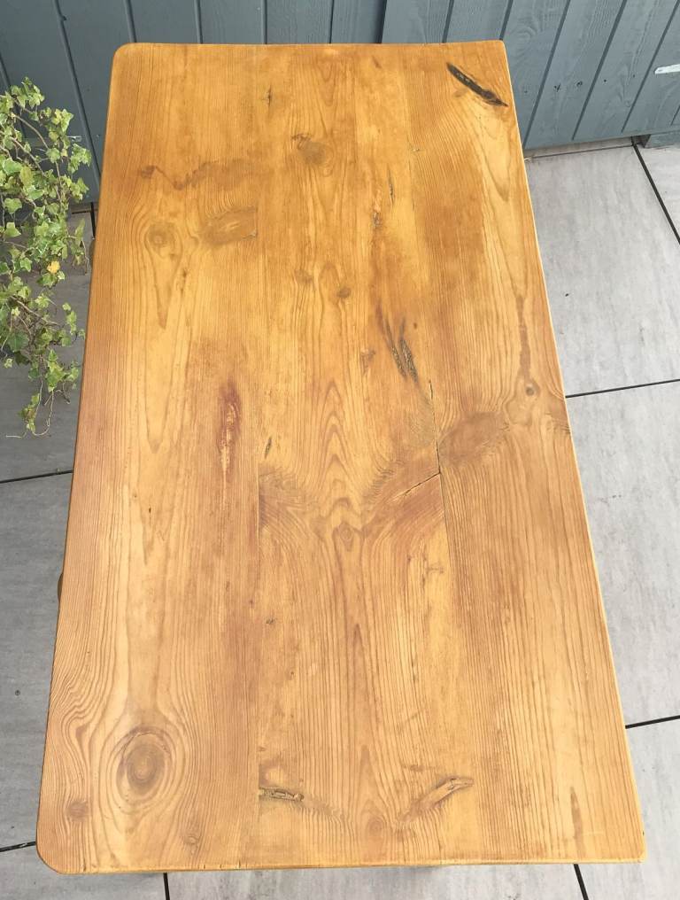 A VICTORIAN PINE SIDE TABLE