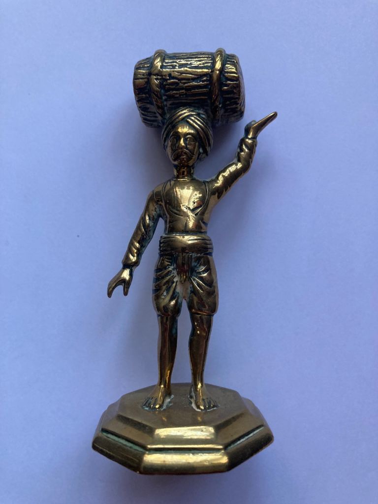 Small Gold Metal Figurine - Man with Barrel on Head, Good Condition