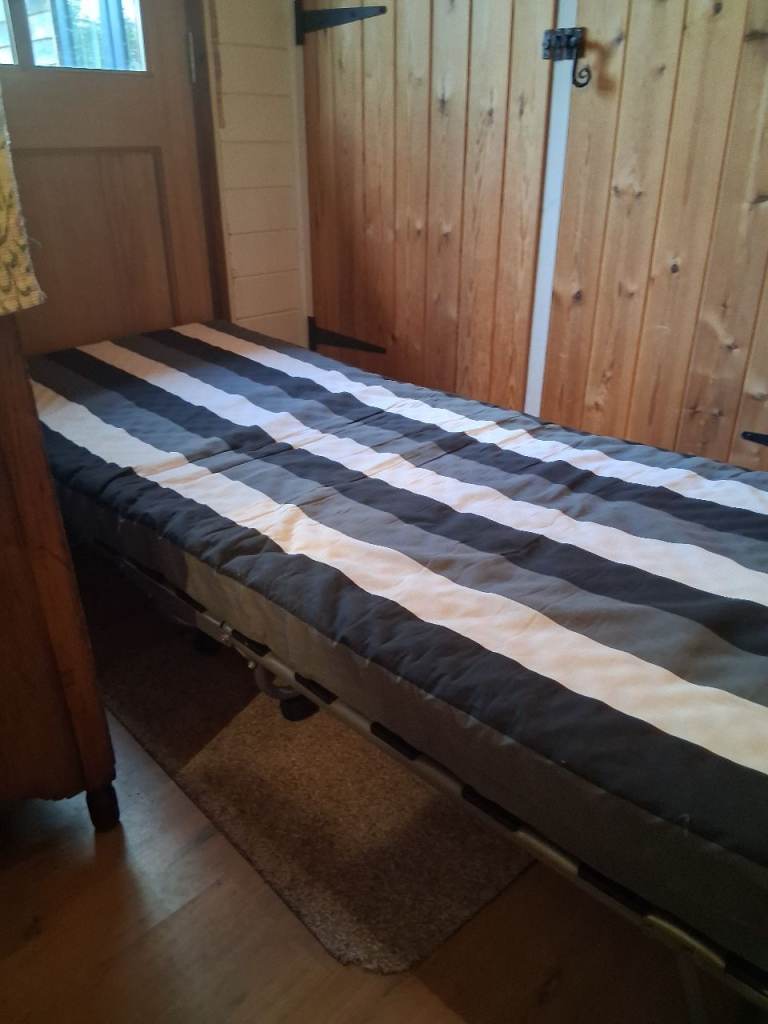 Fold up single bed with mattress