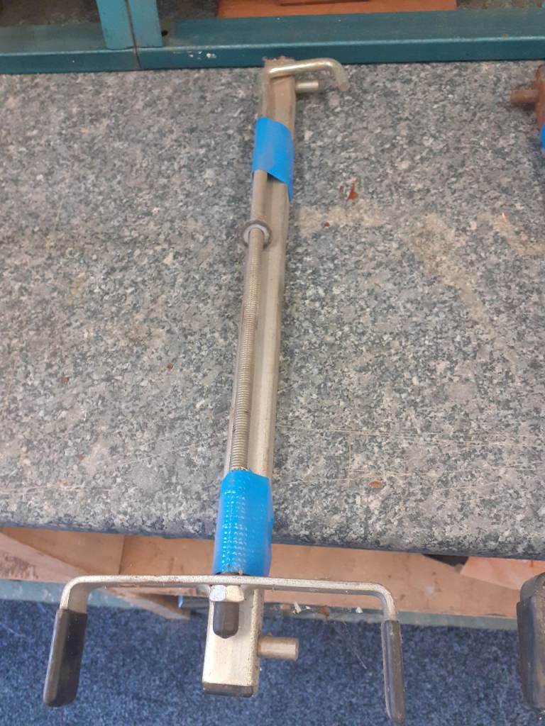 Roof rack ladder clamps