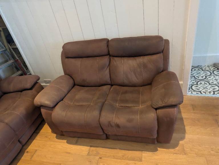 Pair of brown suede recliner sofas