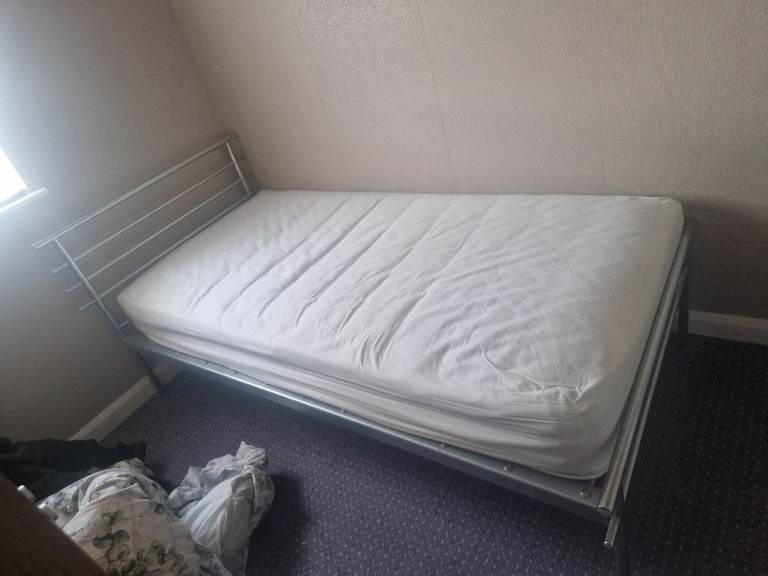 Silver metal bedframe and mattress 