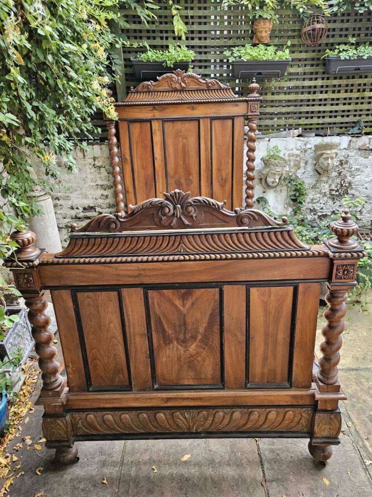 Antique wooden bed, Belgian, Napoleon III (1870s), barley twist columns, carved oak detailing. 