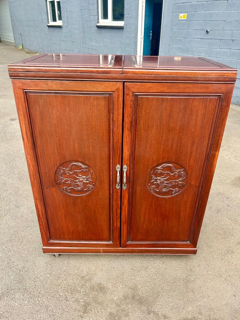 Vintage Mid-Century Chinese Carved Mahogany Home Bar Cabinet on Wheels