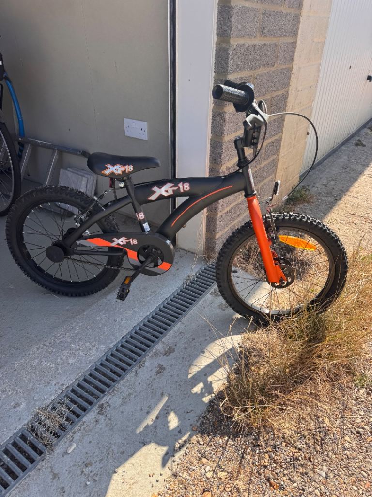 XG-18 Kids Bike – Black and Orange, Good Condition