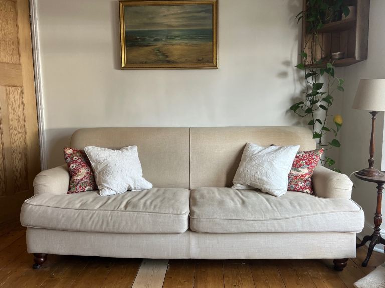 Comfortable Beige Three-Seater Sofa – Good Condition