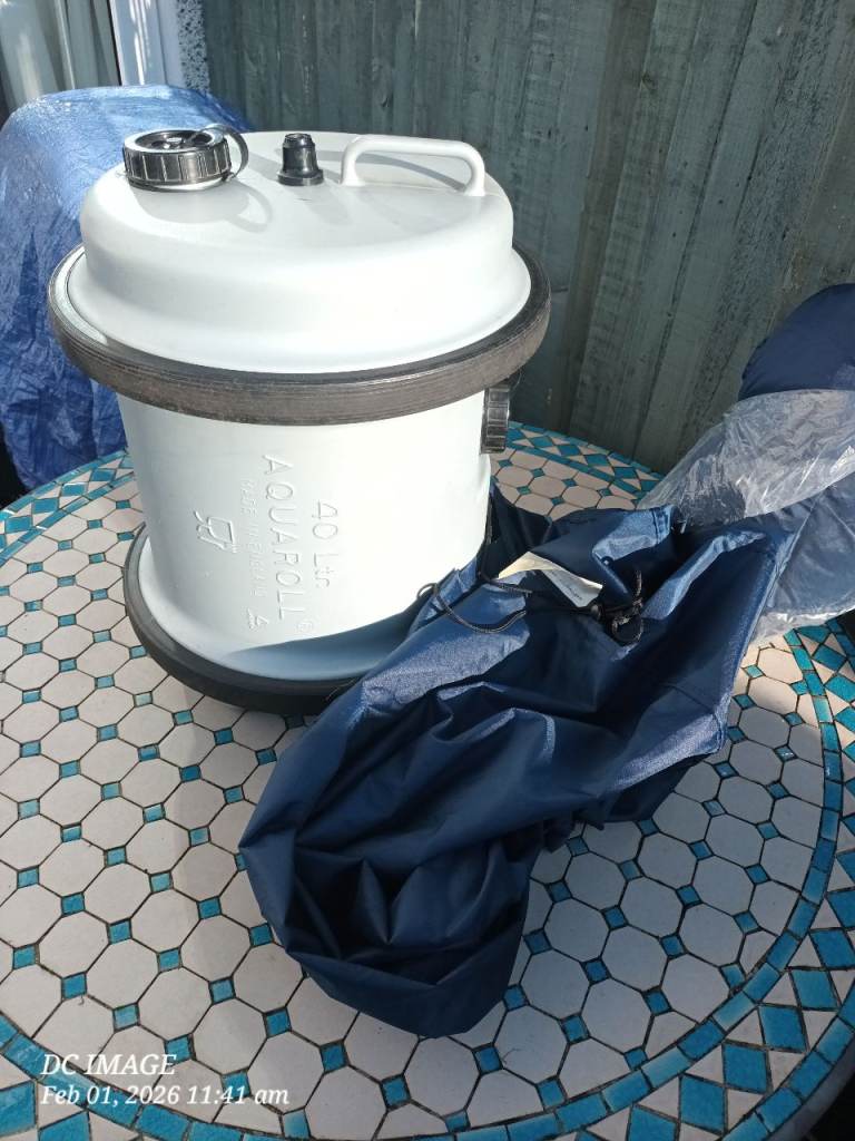 Caravan waste and fresh water containers