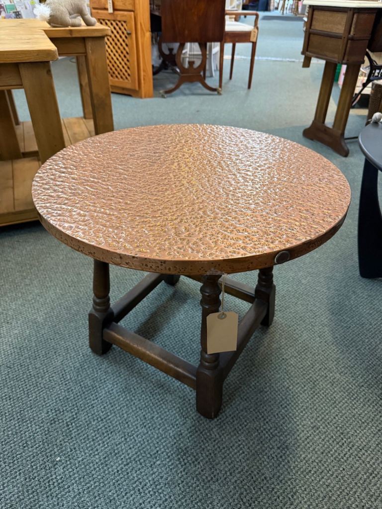 Beaten copper topped coffee table 