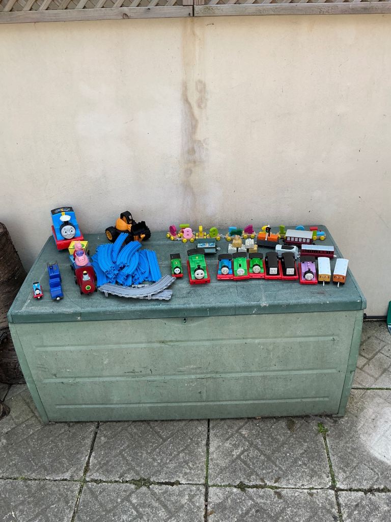 Box of toy trains mainly Thomas the tank & peppa pig & more 