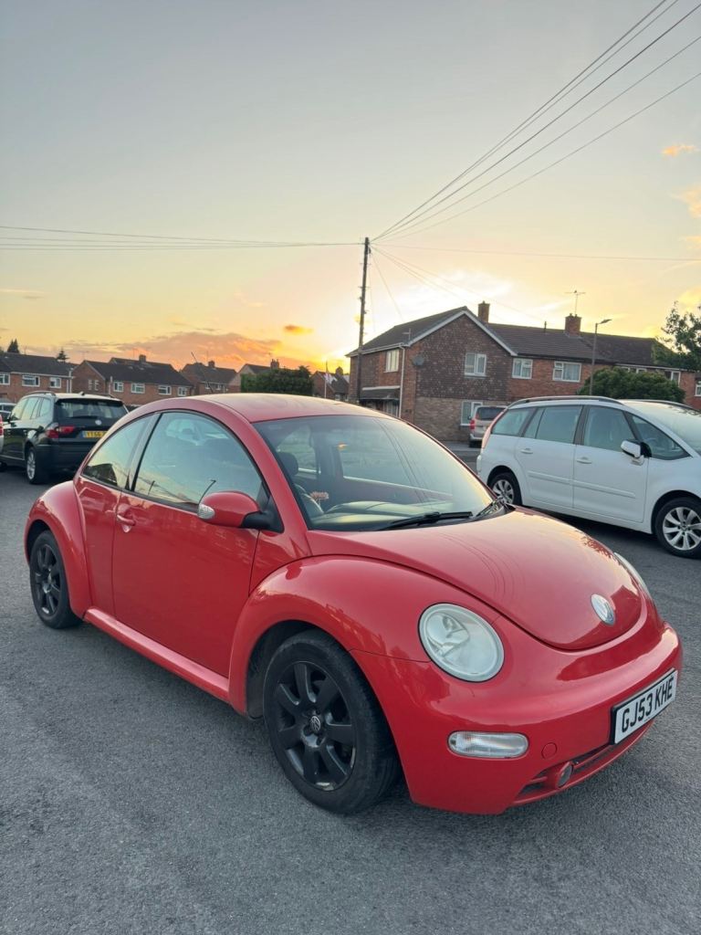 Orange Volkswagen Beetle 1.9 TDI 