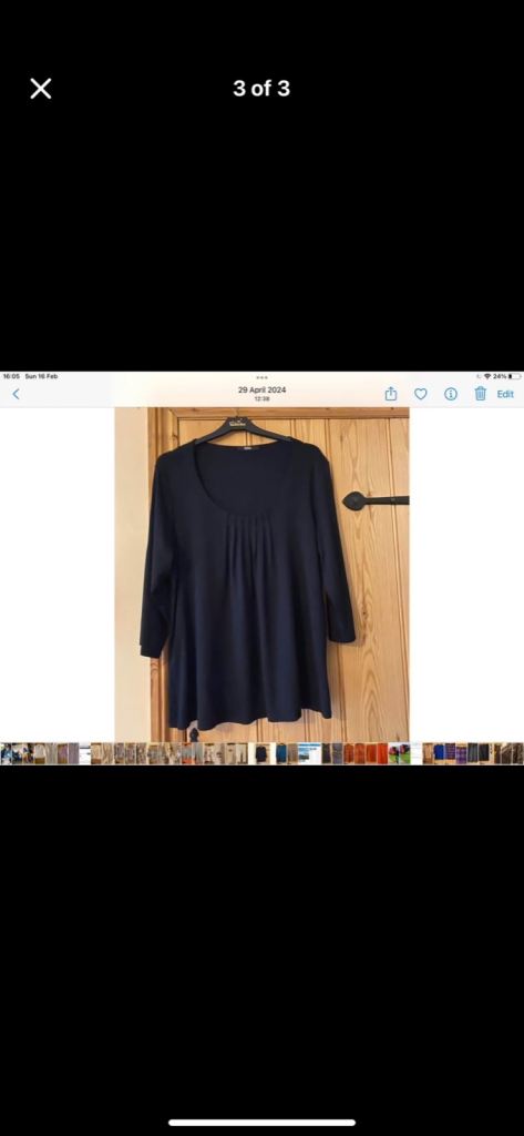 Unusual Ladies 3/4 length sleeve top. By Marks and Spencer.