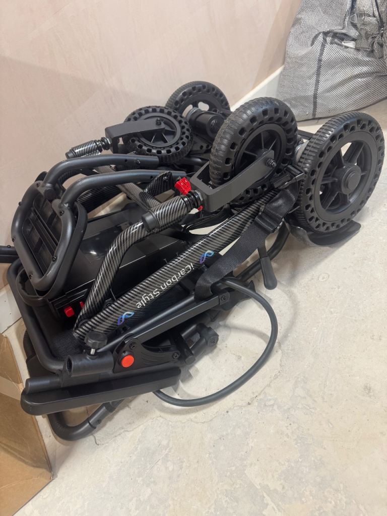 iCarbon Style Electric Wheelchair – Like New, Folding