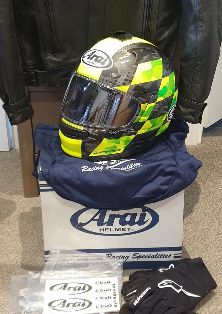 Arai motorbike helmet size M new unused. Comes with anti fog screen, bag and box