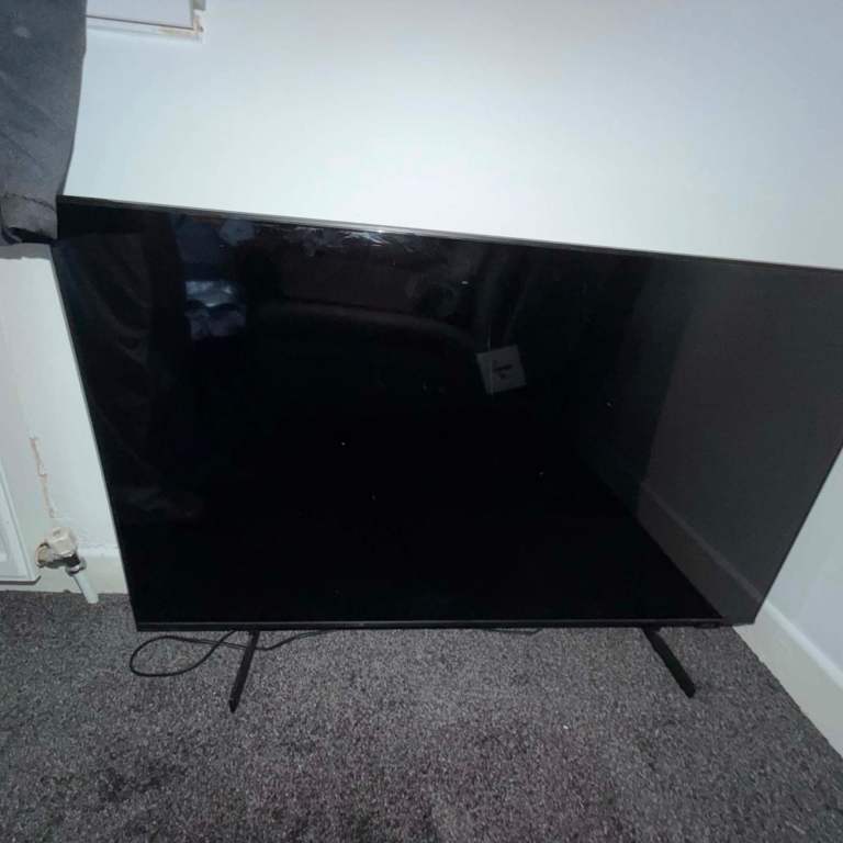 Samsung Black Flat Screen TV with Stand – Good Condition