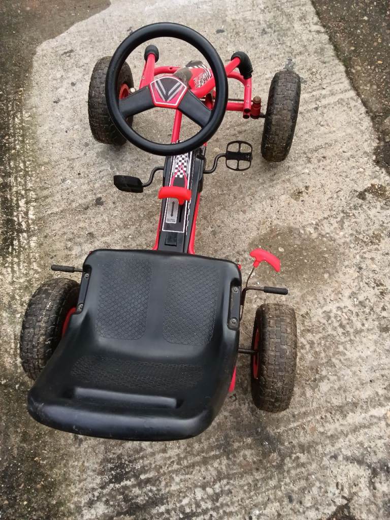 Childs pedal car forward and reverse