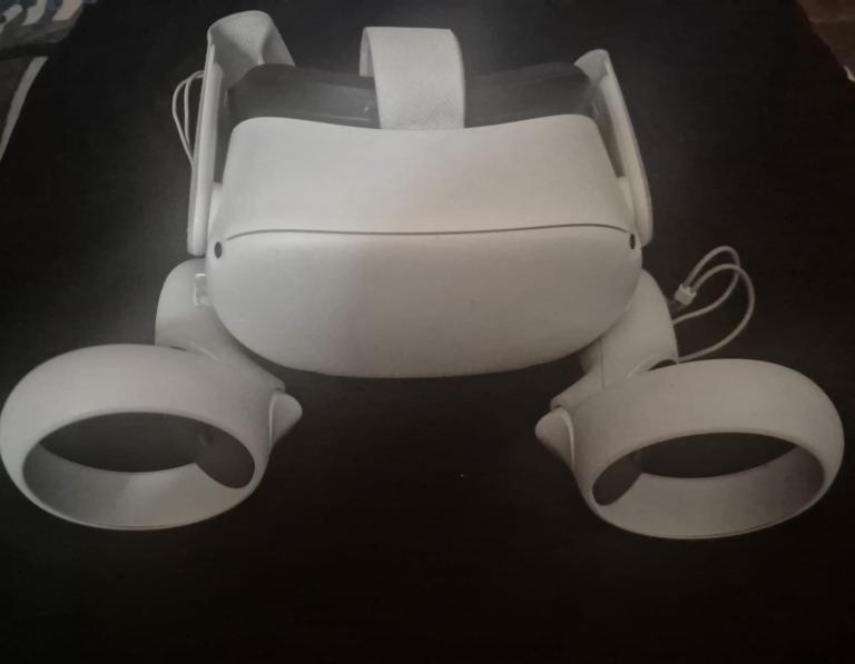 Oculus Quest 2 VR Headset with Controllers – Good Condition