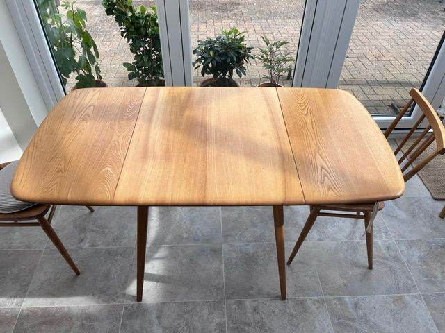 Ercol light oak dropleaf dining table