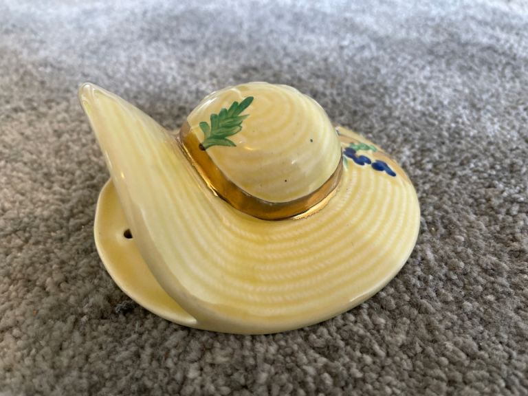Vintage yellow wall pocket vase sun hat from the 1950’s